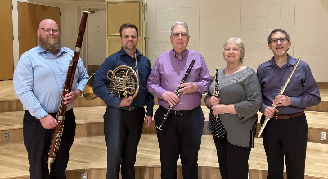 Cascadia Winds: 5 players holding instruments